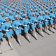 Female members of Chinese militia march in formation during a training session for the 60th National Day Parade Village on the outskirts of Beijing
